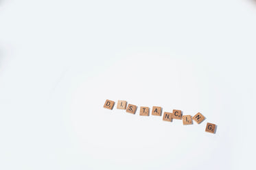 scrabble letters spell distancing
