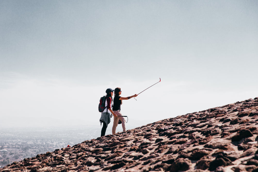 selfie hikers on cobblestone hill