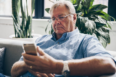 senior using cell phone