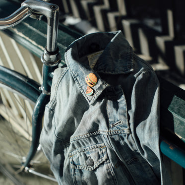 trendy jean jacket on vintage bike