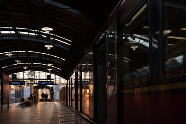 setting sun illuminates train platform