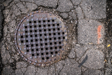 sewer grate in pavement