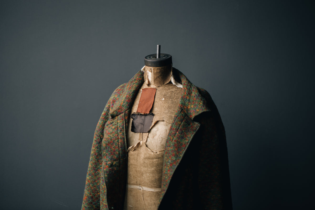 sewing body form with wool coat