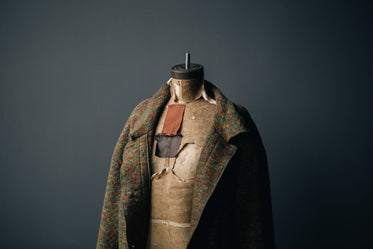 sewing body form with wool coat
