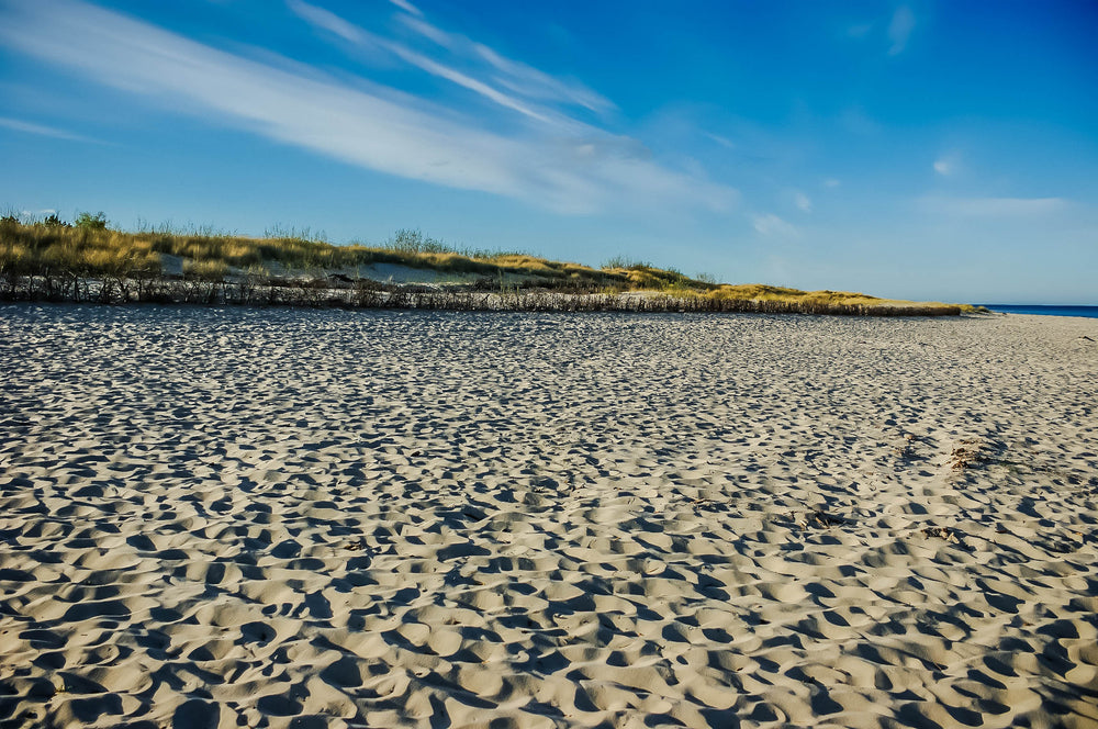 shadows creating texture in soft beach sand