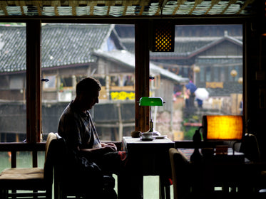 Shadows Fill Coffee Shop Setting