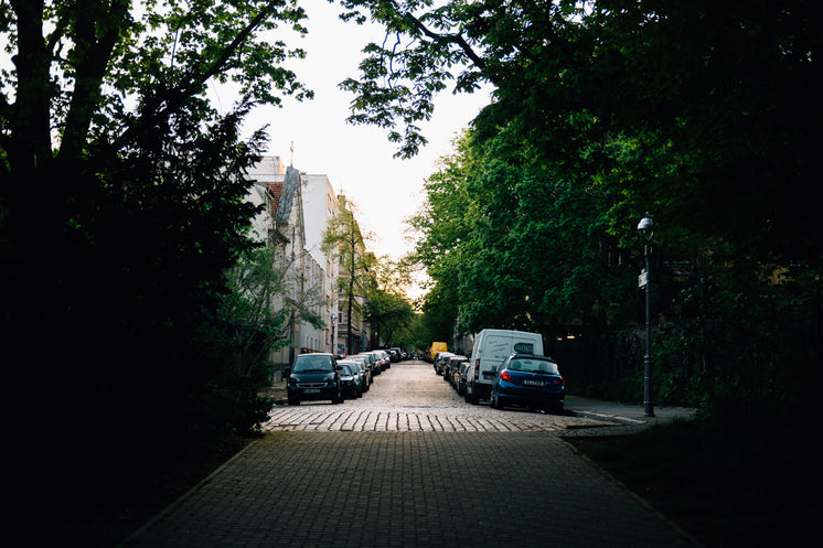 shadowy-side-street-with-cars-parked.jpg