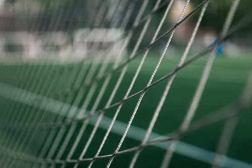 shallow depth photo of soccer net