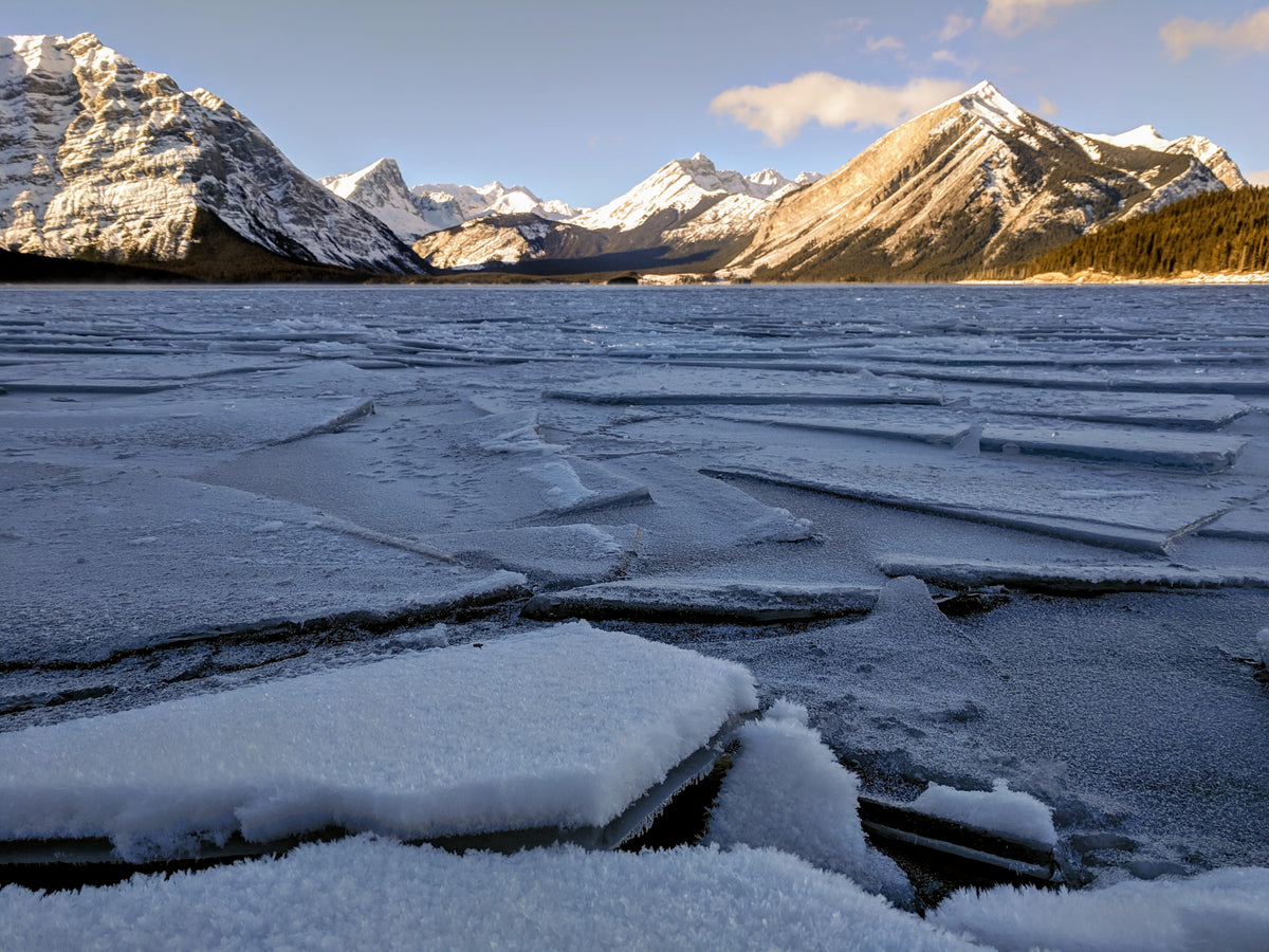 sheets of ice formed on a frozen lake