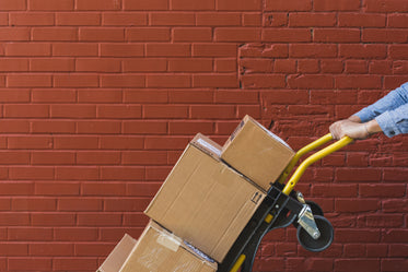 shipping boxes on red brick