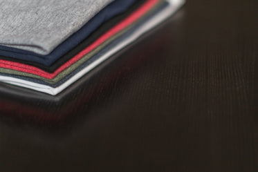 Picture of Shirts On Table - Free Stock Photo