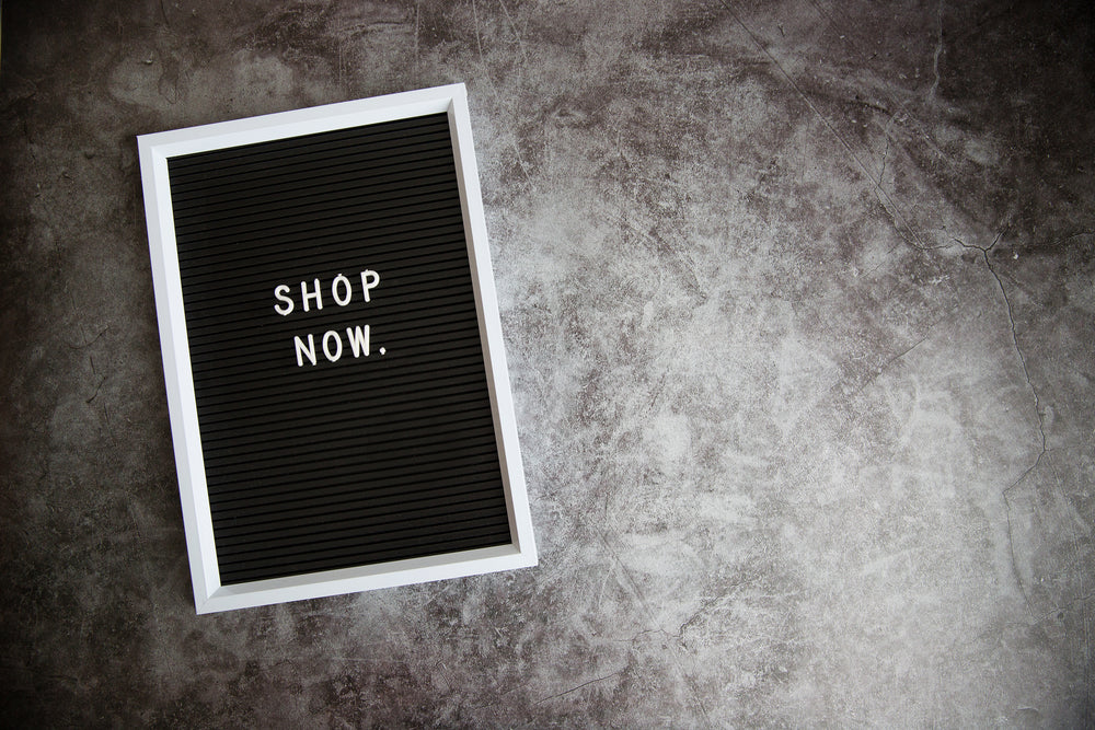 shop now on letter board