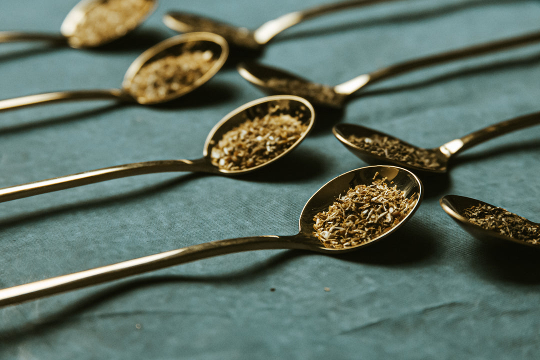 tea leaves on spoons