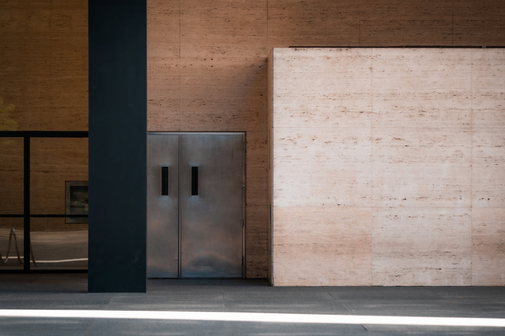 side of a building with silver doors