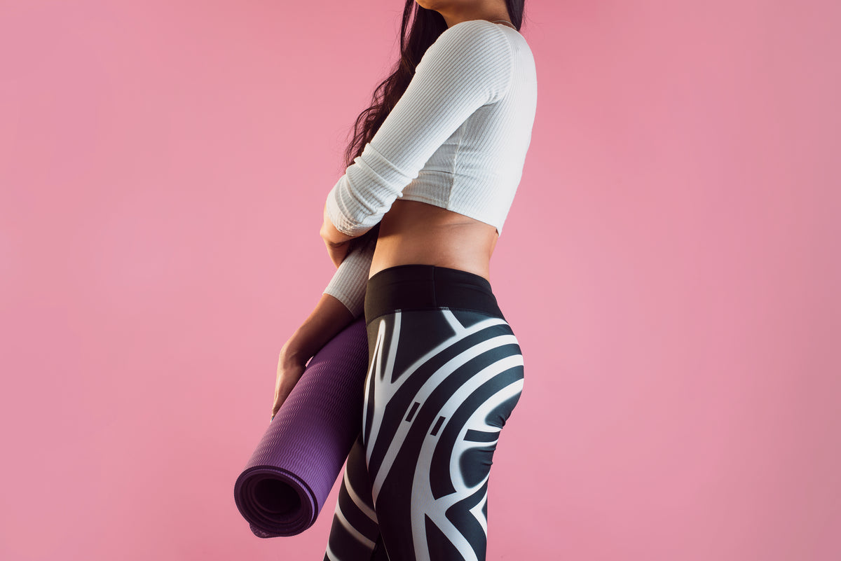 side profile of female yoga outfit