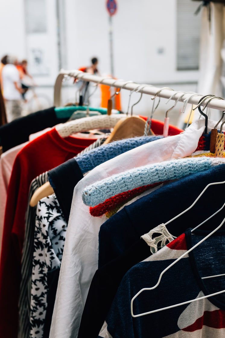 side-view-colorful-clothing-on-hangers.j