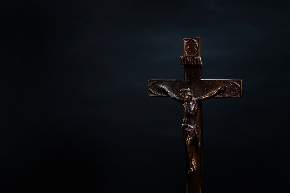 side view of old wooden carved cross