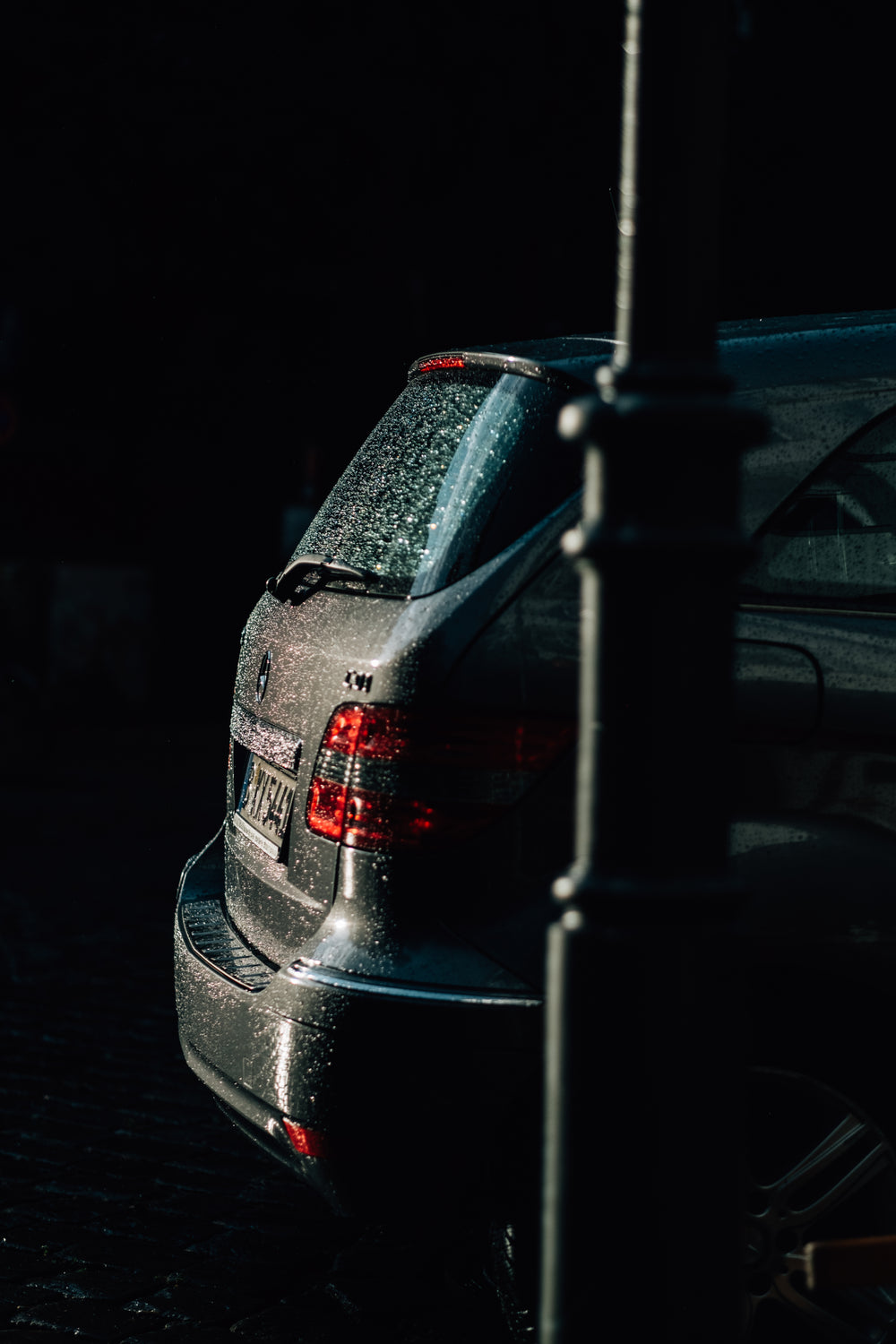 side view of the back of a wet van