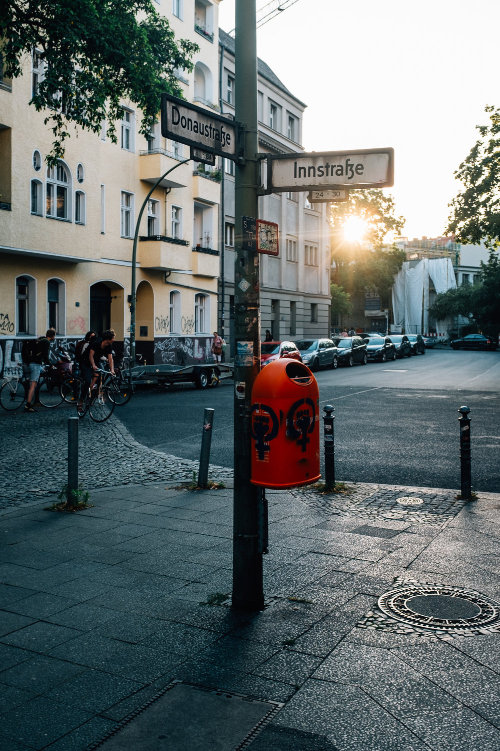 sidewalk with a poled street sign