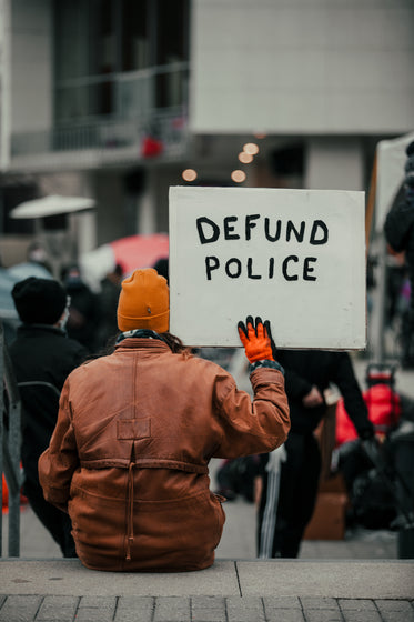 sign saying defund the police