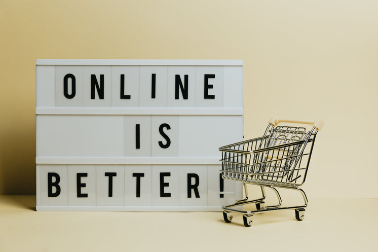 Sign Says Online Is Better With A Small Shopping Cart