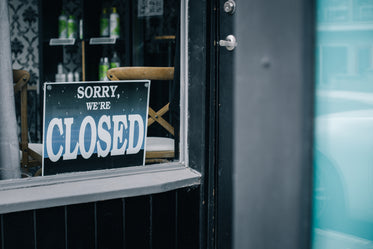 signboard with caption closed in the window