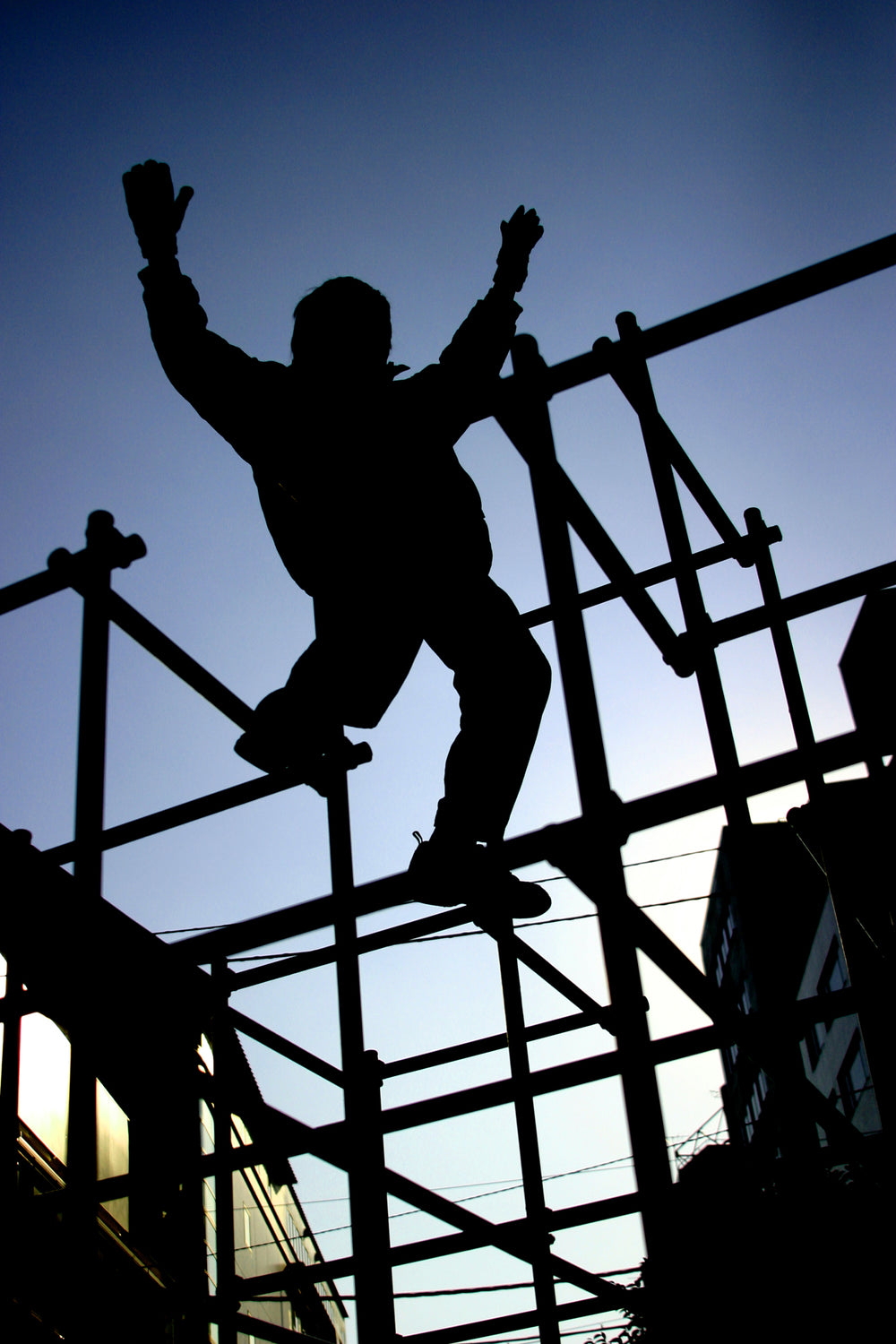 silhouette person arms up