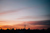 silhouetted berlin city skyline at sunset
