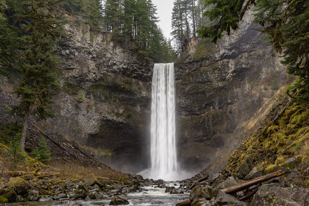 silky smooth waterfall gliding over rock face