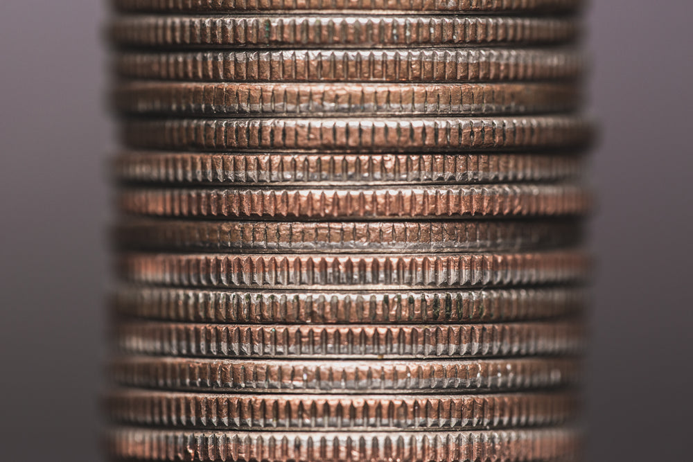 silver coin stack close up