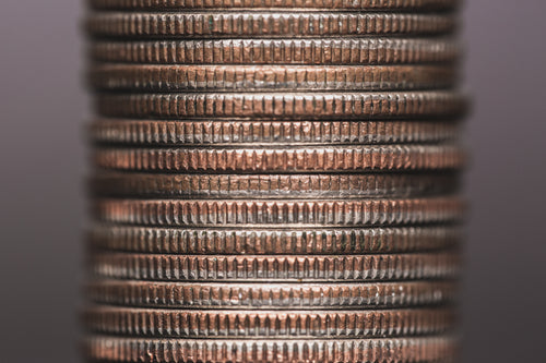 silver coin stack close up