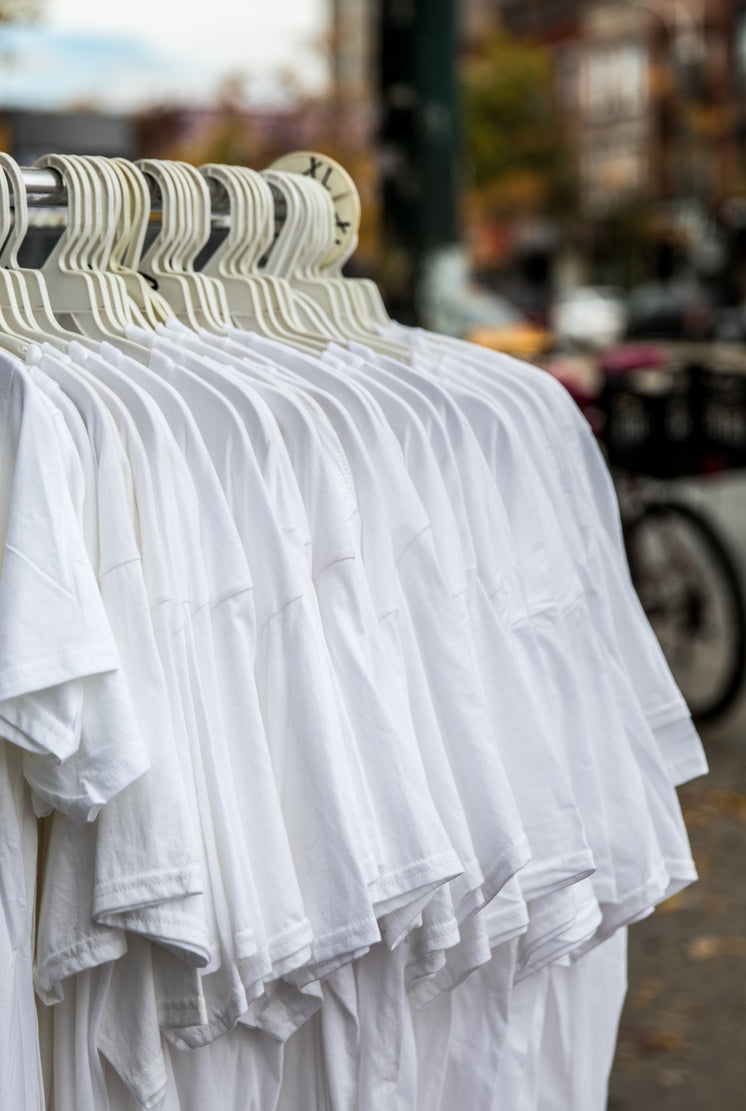 simple-white-shirts-on-shop-clothing-rac