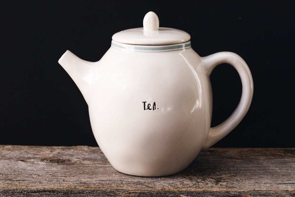 simple white teapot