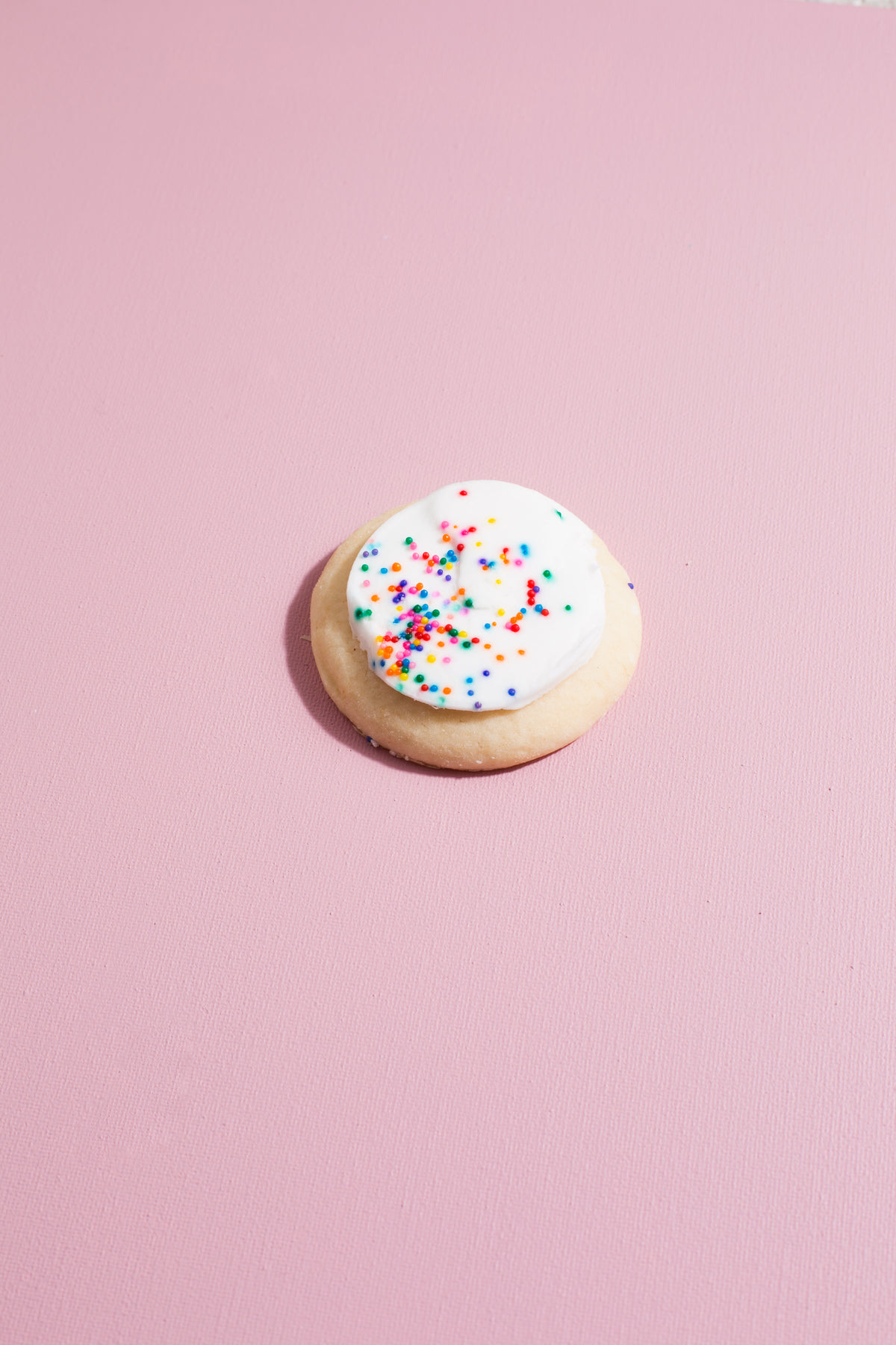 single cookie on pink