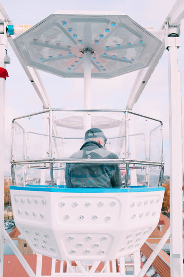 sitting in a ferris wheel