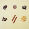 six different spices against a yellow background