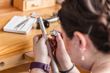 sizing a ring while using a loupe