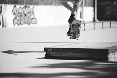 skateboarder ollie black and white