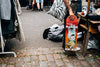 skateboarder shops in an outdoor market