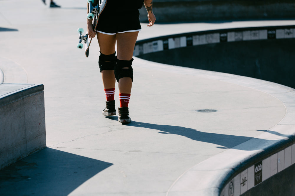 skater leaves the bowl at outdoor skate park