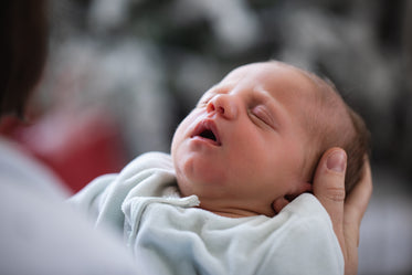 sleeping newborn baby face