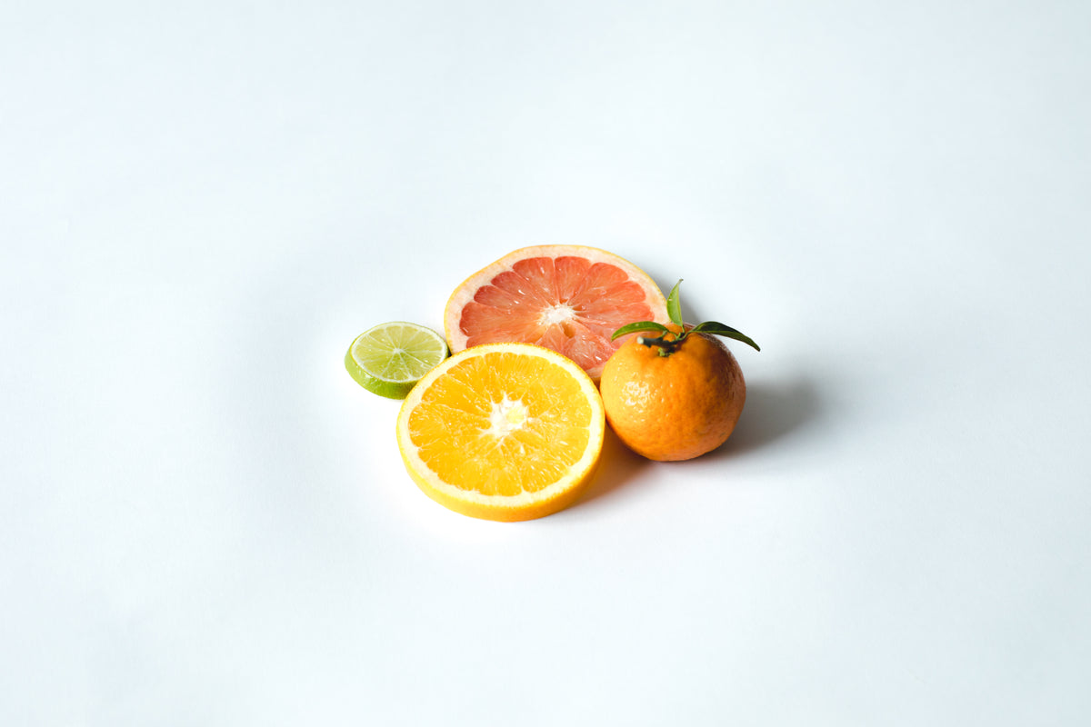 sliced orange, lemon, and lime