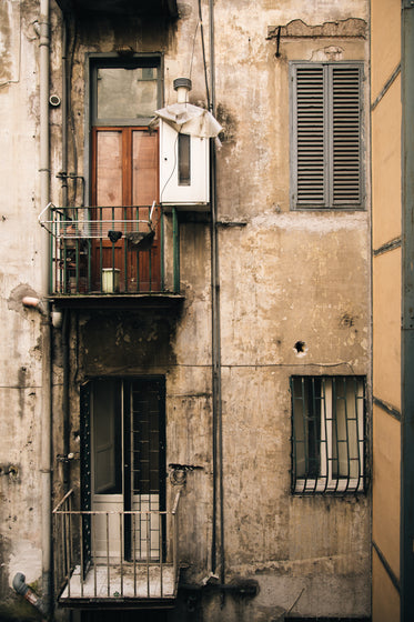 small balconies on an old building