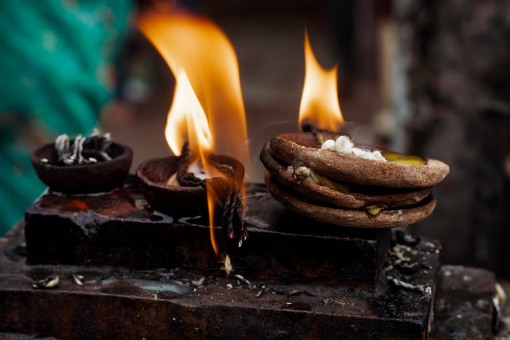 small cloth on fire as they lie in bowls