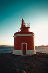 small red and white lighthouse