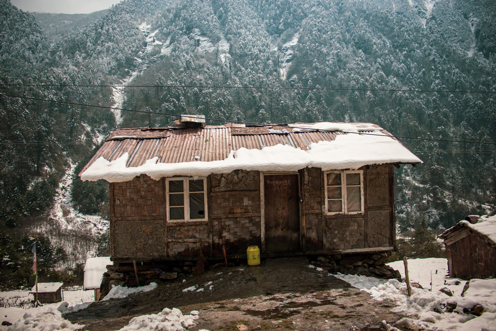 small rustic cabin on a mountaintop