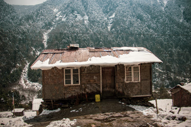 small rustic cabin on a mountaintop