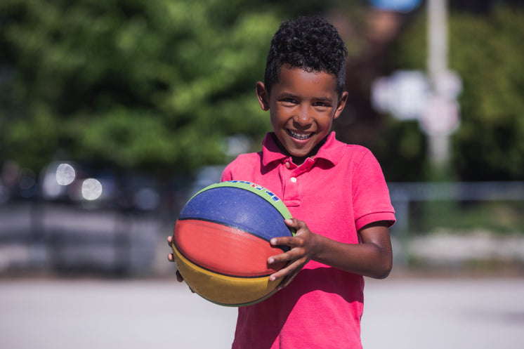 Smiling Boy With Basketball