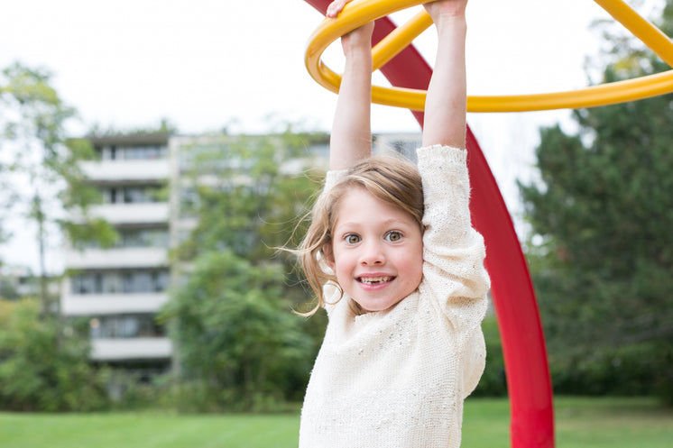 Smiling Girl At Playground