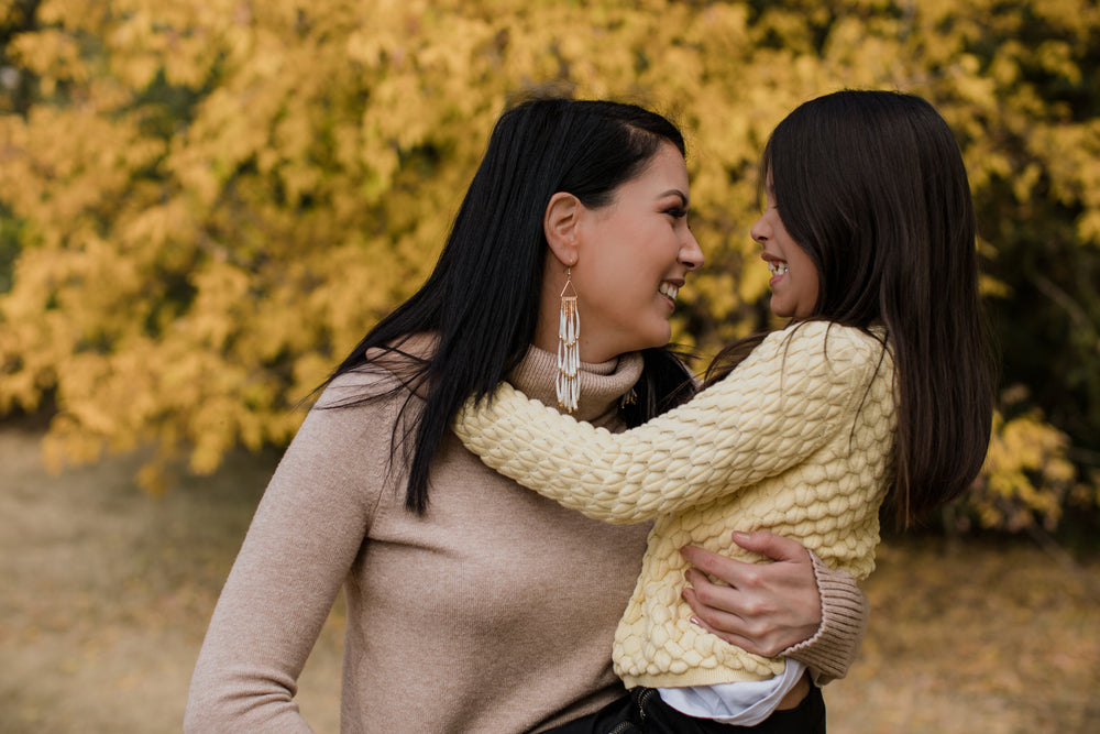 smiling portrait of woman and child